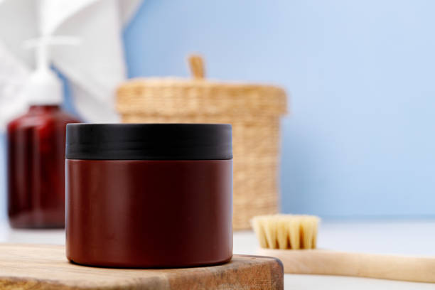 istock Brown skicare container against blue bathroom background 1293018722