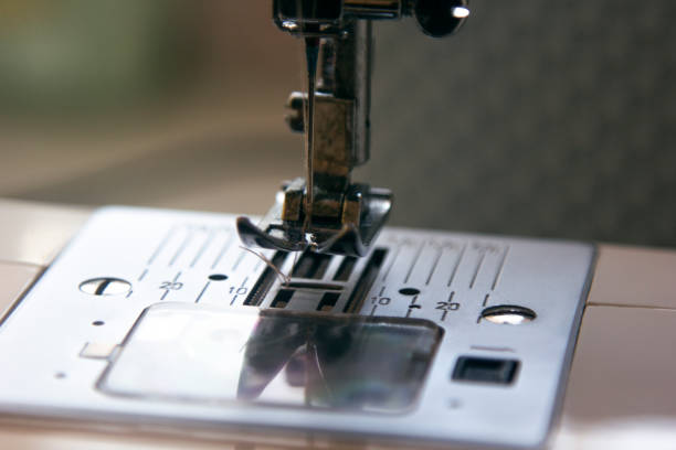 istock tailor's sewing machine, close-up view of the needle. (fashion house) 1293019643