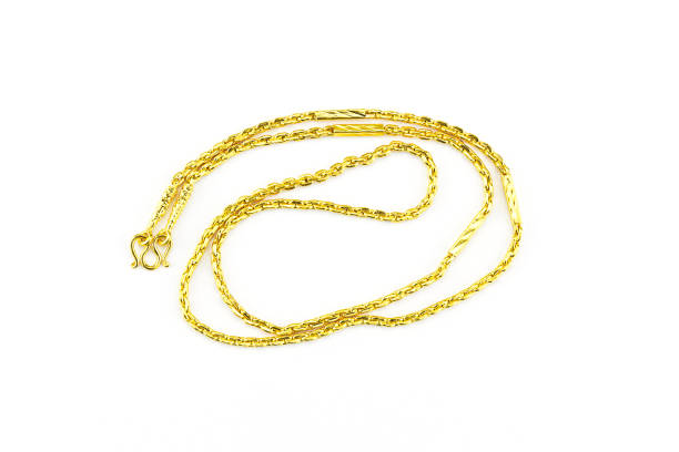 istock Gold chain necklace isolated on white background 1293021543
