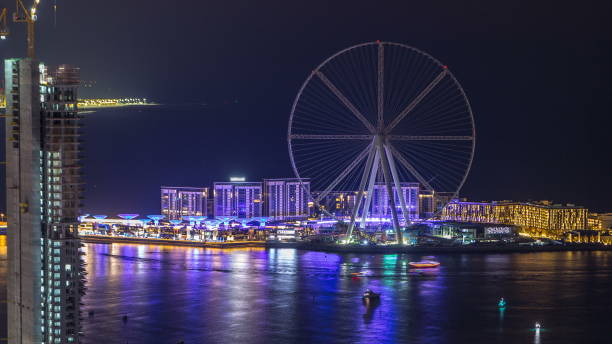 istock Bluewaters island aerial night timelapse with ferris wheel 1293023437