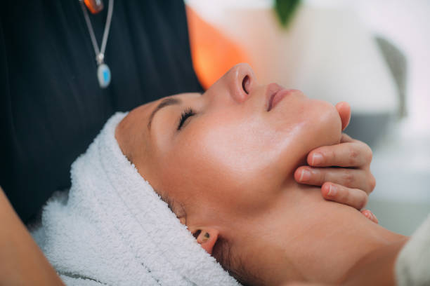 istock Ayurvedic Face Massage Therapy with Essential Aromatherapy Oils 1293023720