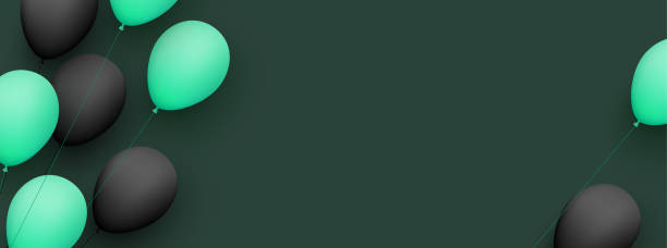 istock Black and green balloons with threads on dark green background. 1293028707