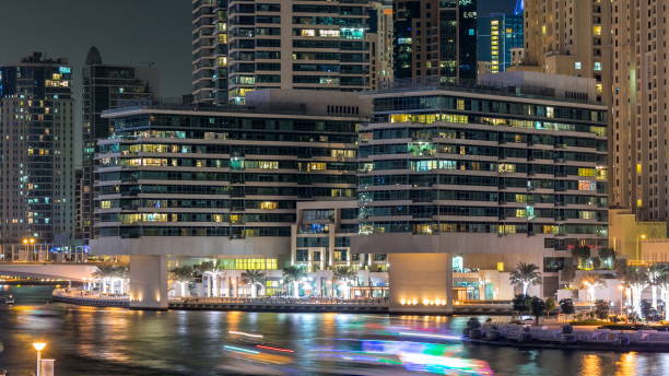 istock Promenade in Dubai Marina timelapse at night, UAE 1293031326