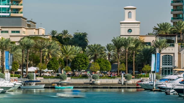 istock Fountain and palms timelapse at the Marina walk, During day time. Dubai, UAE 1293032247