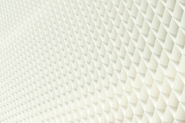 istock A white geometric architectural pattern. A wall of a modern building made of crossed thin metal planks painted in white color 1293034547