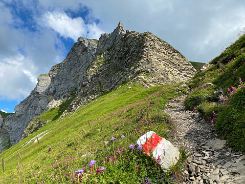 Mountaineering signposts and markings on the slopes of the Melchtal alpine valley and in the Uri Alps mountain massif, Kerns - Canton of Obwalden, Switzerland (Kanton Obwald, Schweiz)