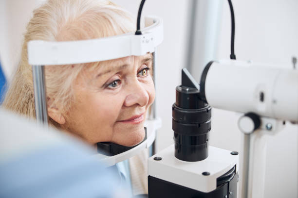 istock Elderly female patient having an eye checkup 1293039028