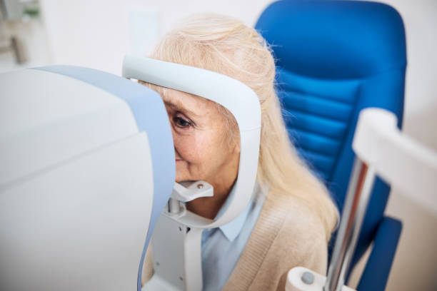 istock Blonde woman having her intraocular pressure measured 1293039030