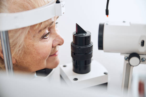 istock Calm senior lady having her eyes checked 1293039031