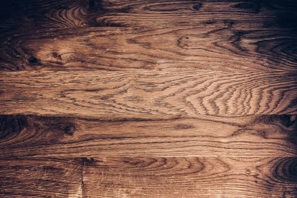 istock Dark wood texture. Background dark old wooden panels 1293041066