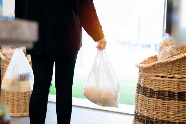 istock Young woman buys dairy products 1293041522