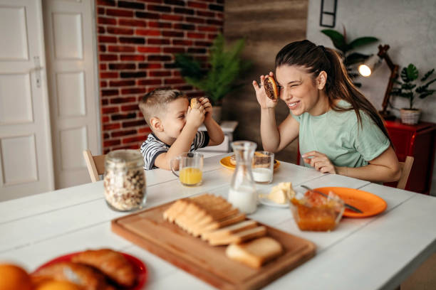 istock Mom and son enjoy breakfast together 1293042718
