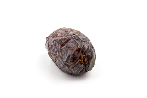 istock Dried dates fruits isolated on white background 1293047452