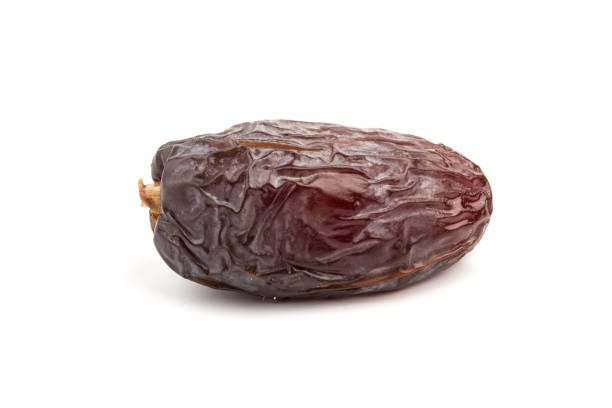 istock Dried dates fruits isolated on white background 1293047500