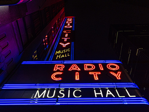 Radio City Music Hall neon sign at night