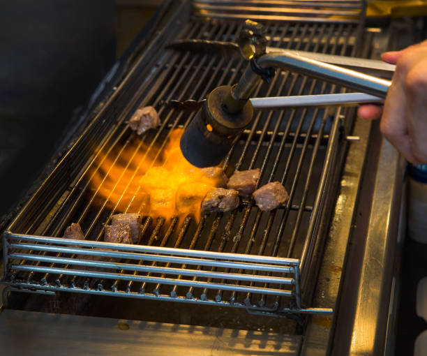istock Delicious fire-roasted beef at the party. 1293053285