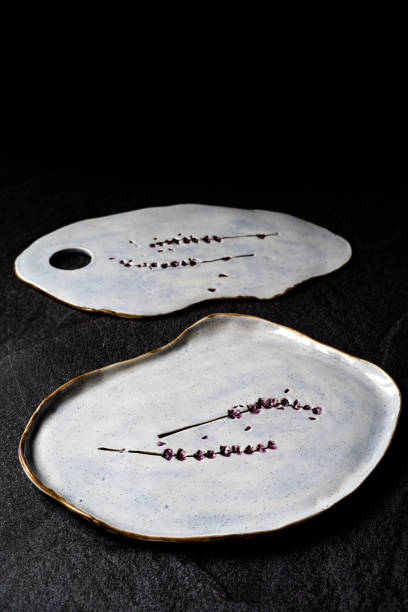 istock Handmade Ceramic Plates and Trays. Handcrafted with Traditional Ottoman Pattern on Dark Surface and Backround. Handicraft. 1293056201