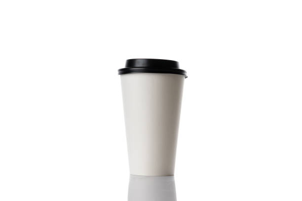 istock White paper cup for hot coffee with black lid isolated on white background. Takeaway blank small tea cup for your design text or banner of brand. 1293057797
