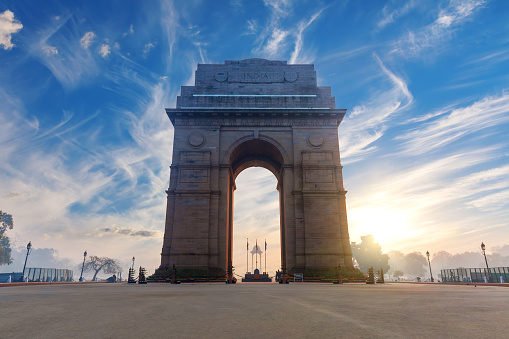 India Gate at sunrise, famous landmark of New Dehli, no people.