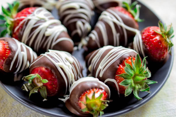 Close Up Chocolate Covered Strawberries Close Up Dipped Chocolate Drizzled Strawberries Served On Gray Plate, Chocolate Covered Strawberries Chocolate Dipped stock pictures, royalty-free photos & images
