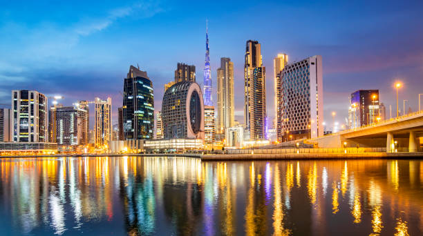istock Dubai city skyline after sunset, UAE 1293061967