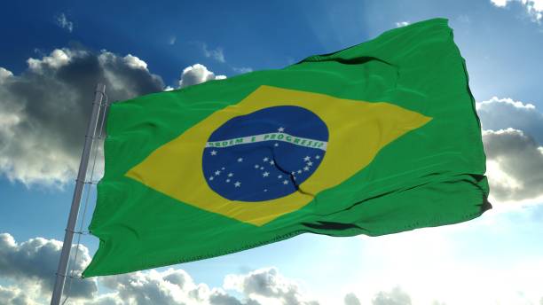 istock Brazil flag waving in the wind, blue sky background. 3d rendering 1293063491