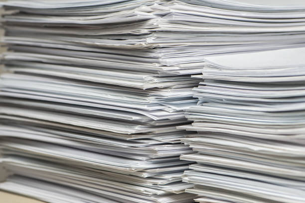 istock pile of paper documents in the office 1293067357