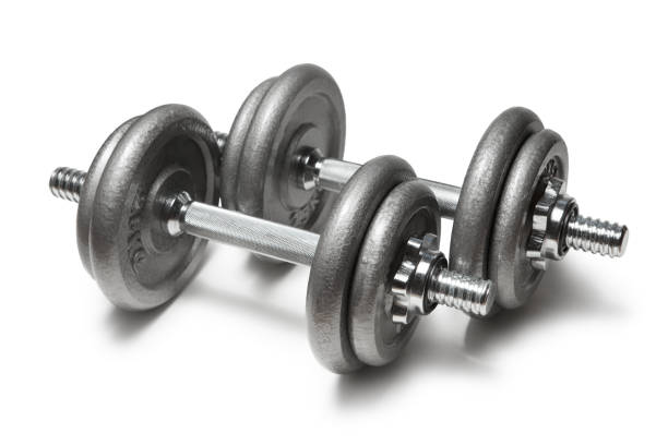 istock Metal dumbbells for fitness with chrome silver handle isolated on white 1293068310