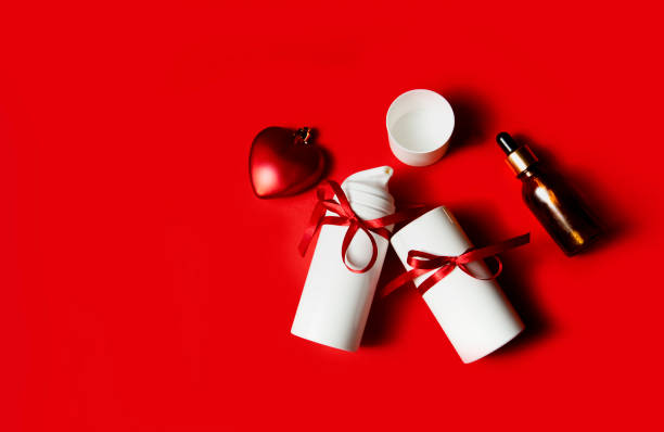istock valentine's day cosmetics gift containers on red background 1293069870