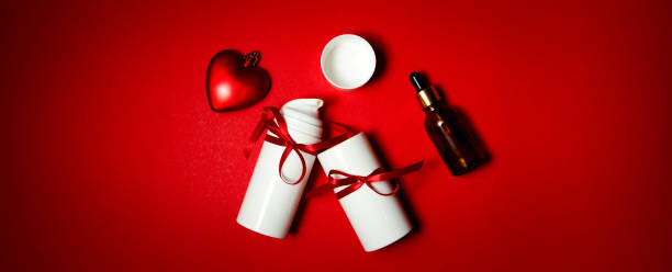istock valentine's day cosmetics gift containers on red background 1293069883