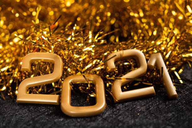 istock Golden 2021 number on a black background. 1293070850