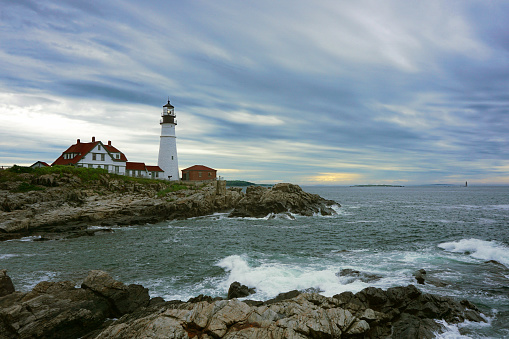 Portland Head Light is a historic lighthouse on Cape Elizabeth, Maine. The lighthouse sits on a rocky headland at the entrance to Portland Harbor.
