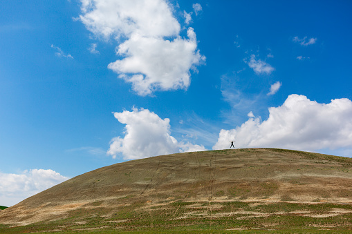 Single man on the hill.