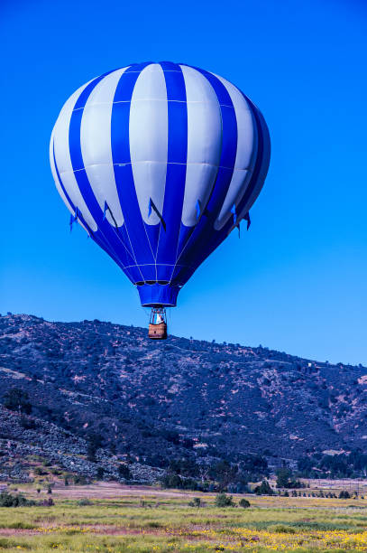 istock Blue and White Hot Air Balloon over Bear Valley Springs 1293072639