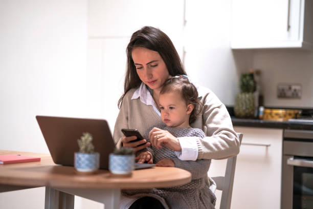 istock Young mother working at home with her daughter 1293076139