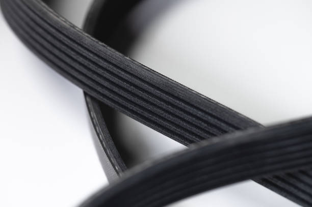 istock new poly V-ribbed alternator belt on gray background close-up macro view 1293078346