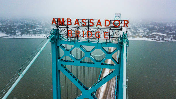 A close up aerial view of the Ambassador Bridge spanning the Detroit River between Windsor Ontario Canada and Detroit Michigan USA stock photo