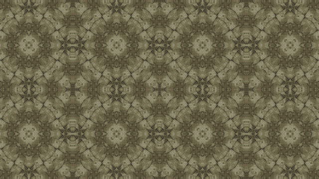 High resolution video, in earth tone colors, of kaleidoscopic patterns in motion.