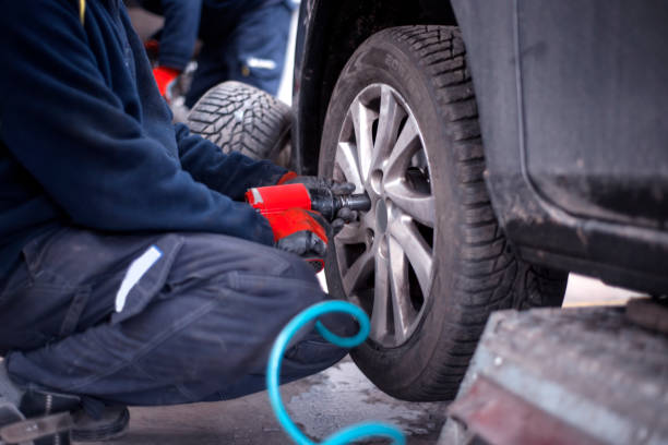 istock An unrecognizable tire repairman using a pneumatic wrench on wheel nuts 1293092811