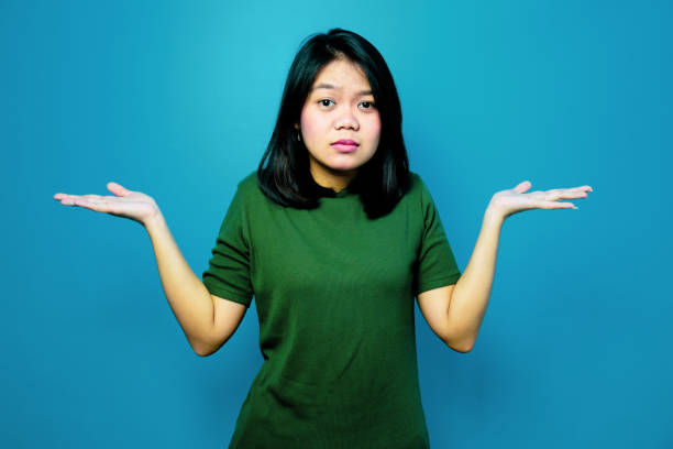 istock I Don't Know Gesture, Confused girl 1293097629