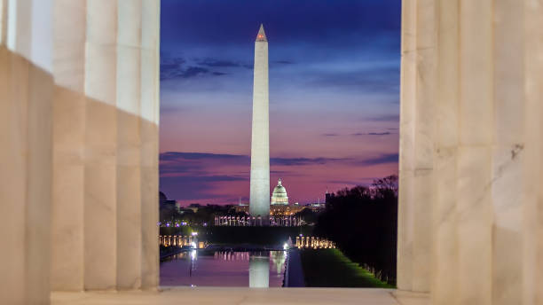 istock Washington monument, mirrored in the reflecting pool in Washington, DC. 1293099610