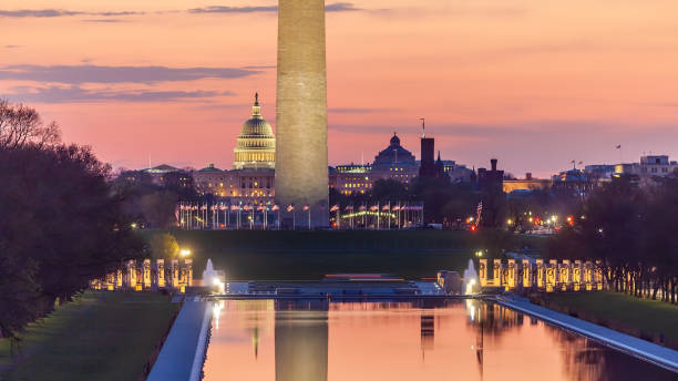 istock Washington monument, mirrored in the reflecting pool in Washington, DC. 1293099615