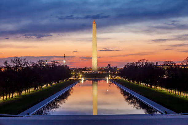 istock Washington monument, mirrored in the reflecting pool in Washington, DC. 1293099638