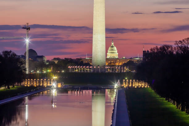 istock Washington monument, mirrored in the reflecting pool in Washington, DC. 1293099651