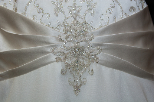 Detailed close up of a wedding dress