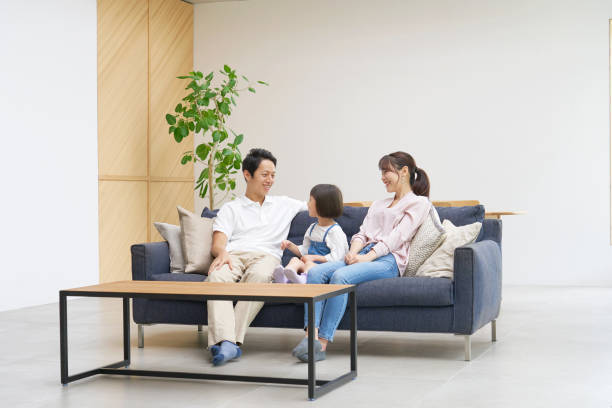 Asian family talking at home