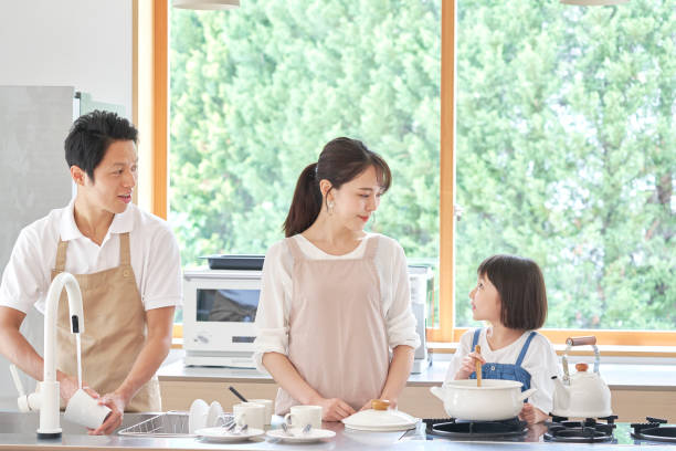 istock Asian family cooking at home 1293109583