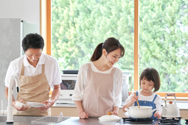 istock Asian family cooking at home 1293109615