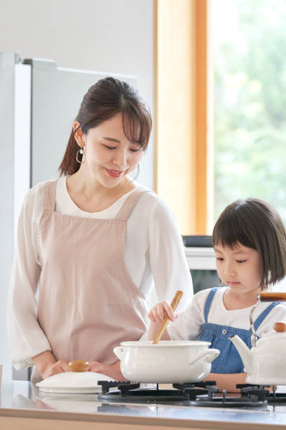 istock Asian family cooking at home 1293109616