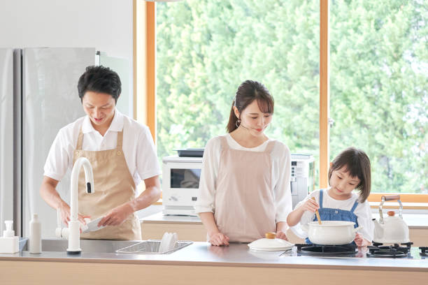 istock Asian family cooking at home 1293109618